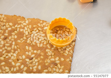 Ready carrot sponge cake with pine nuts. Ready carrot sponge cake with pine nuts. 55147077