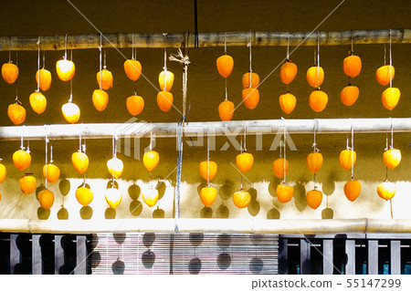 Dried sweet potato hung on the eaves of old houses 55147299
