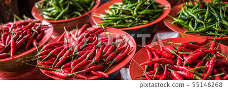 Colorful chilli peppers stall at asian market Colorful chilli peppers stall at asian market 55148268