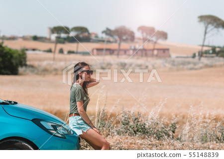 Woman for a new adventure looking for the right way on the map 55148839