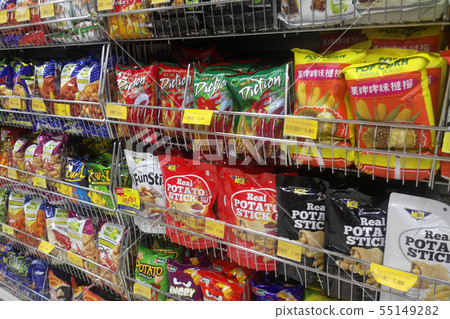 Packed miscellaneous junk foods & snacks on rack 55149282