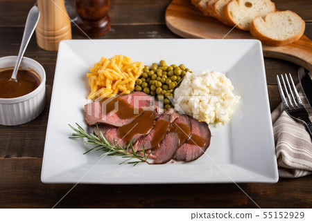 roasted beef serving with gravy sauce, mashed roasted beef serving with gravy sauce, mashed 55152929