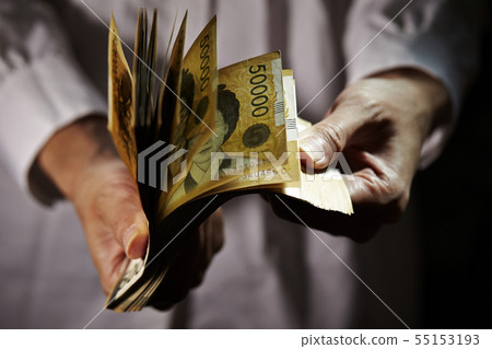 Women Counting Banknotes of 50,000 Won Bills Korean Economic Image Women Counting Banknotes of 50,000 Won Bills Korean Economic Image 55153193
