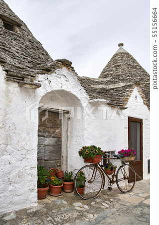 Old trulli houses in Alberobello town in Italy Old trulli houses in Alberobello town in Italy 55156664