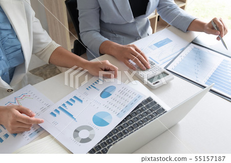 two business CEO analyzing report to success plan. 55157187