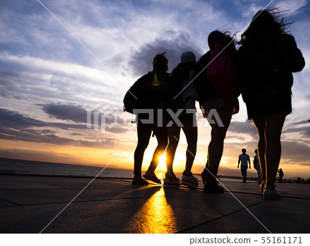Sunset sundown family lovers friends silhouette couple coast walk silhouette sunset sunset Sunset sundown family lovers friends silhouette couple coast walk silhouette sunset sunset 55161171