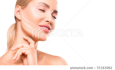 Face-lifting concept. Woman portrait with an arrows on the face. 55163062