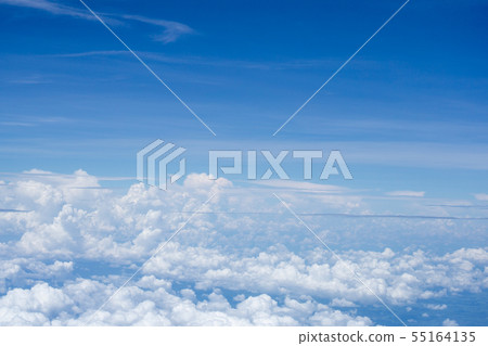Top view on plane of Blue sky and white puffy 55164135