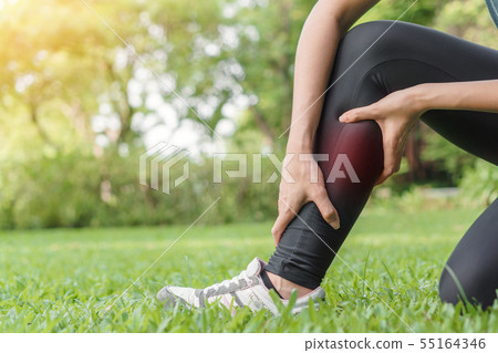 Young woman asian have accident leg twist sprain 55164346