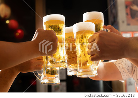 Image toasting with beer at tavern Image toasting with beer at tavern 55165218