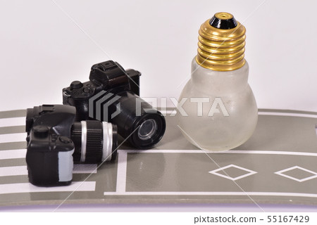 Road, camera and light bulb 55167429
