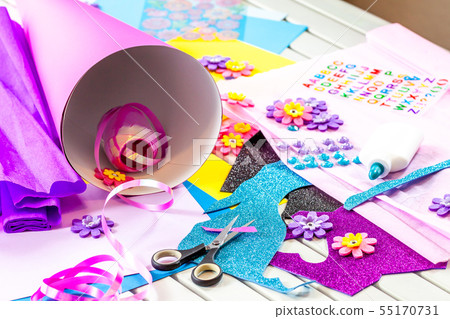 Making paper crafts for candy cone first day of school 55170731