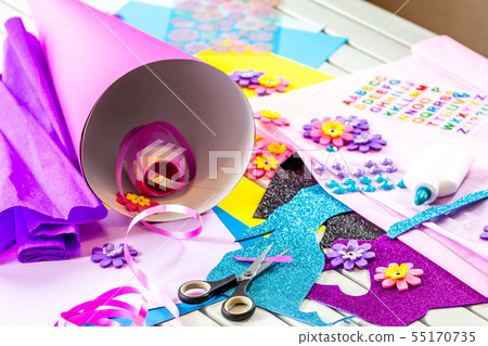 Making paper crafts for candy cone first day of school 55170735
