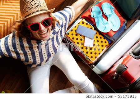 cheerful stylish woman with supper hat and sunglasses cheerful stylish woman with supper hat and sunglasses 55173915