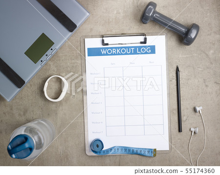 weight scales, black pen and workout log on clipboard weight scales, black pen and workout log on clipboard 55174360