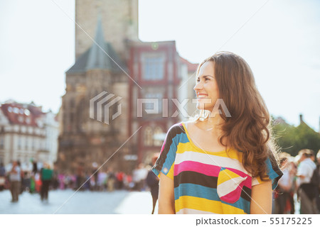 smiling trendy woman in Prague Czech Republic sightseeing 55175225