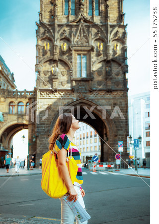 happy young traveller woman exploring attractions happy young traveller woman exploring attractions 55175238