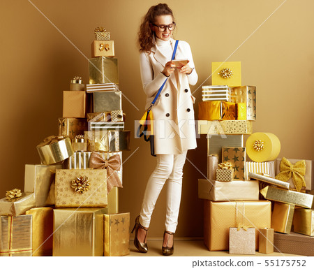 happy woman using smartphone to share on social media platform happy woman using smartphone to share on social media platform 55175752