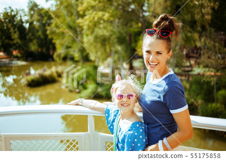 mother and daughter tourists on river boat having river cruise mother and daughter tourists on river boat having river cruise 55175858