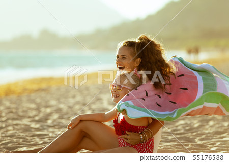 mother and child holding watermelon towel and having fun time mother and child holding watermelon towel and having fun time 55176588