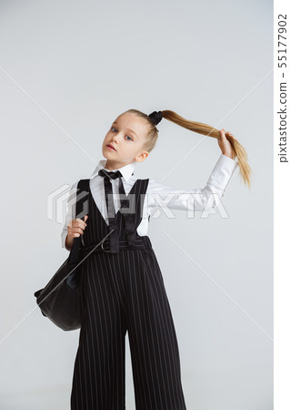 Girl preparing for school after a long summer break. Back to school. 55177902