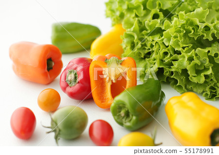 Group image photograph of lettuce and colored peppers and colored tomatoes 55178991