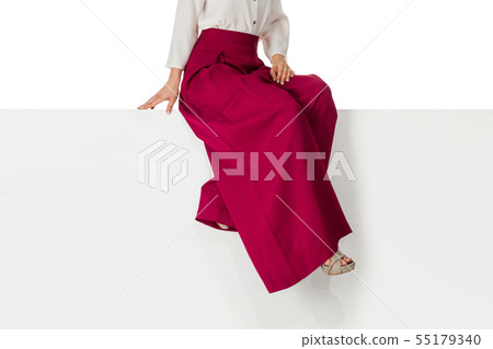 legs woman wearing high heels shoes sitting on bench. legs woman wearing high heels shoes sitting on bench. 55179340