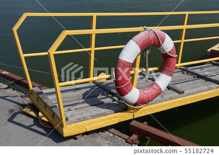 Lifebuoy hangs on the railing Lifebuoy hangs on the railing 55182724