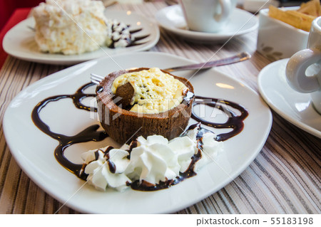 Custard cream and chocolate pie at a cafe in Dolce Italy Florence 55183198