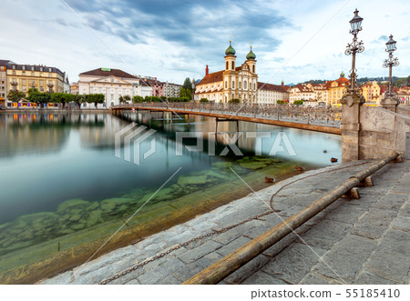 Lucerne. Old city embankment and medieval houses at dawn. Lucerne. Old city embankment and medieval houses at dawn. 55185410