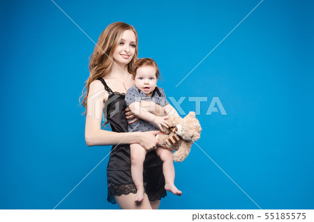 Front view of positive little baby laughing with Front view of positive little baby laughing with 55185575