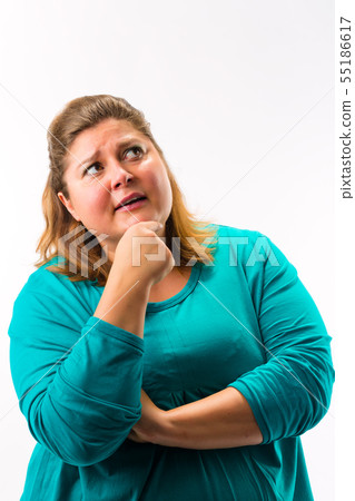 Fatty woman with her hand on chin thinking Fatty woman with her hand on chin thinking 55186617