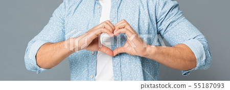 Heart-Shaped Male Hands Gesture Closeup On Gray Background 55187093