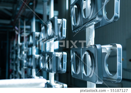 Metal details on hooks before powder painting and surface preparation Metal details on hooks before powder painting and surface preparation 55187127