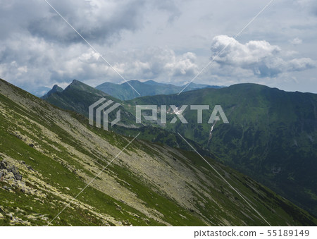 View from Banikov peak on Western Tatra mountains ridge or Rohace panorama. Sharp green mountains - View from Banikov peak on Western Tatra mountains ridge or Rohace panorama. Sharp green mountains - 55189149