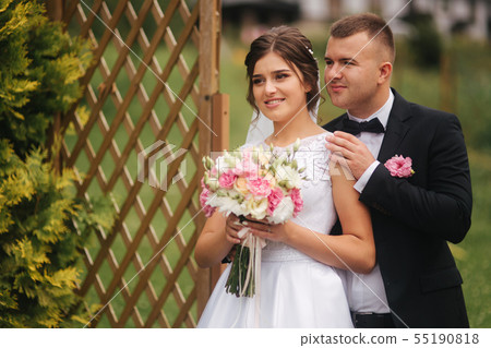 Happy groom and bride smile and have fun. Wedding day Happy groom and bride smile and have fun. Wedding day 55190818
