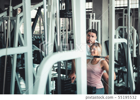 Portrait of Beautiful Woman is Exercising Portrait of Beautiful Woman is Exercising 55195532