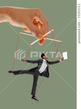 Man like a puppet in somebodies hands. Concept of manipulation 55203311