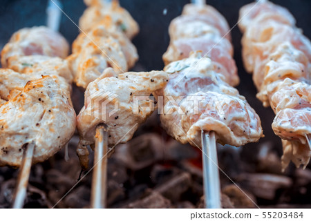Juicy meat barbecue on a hot brazier Juicy meat barbecue on a hot brazier 55203484