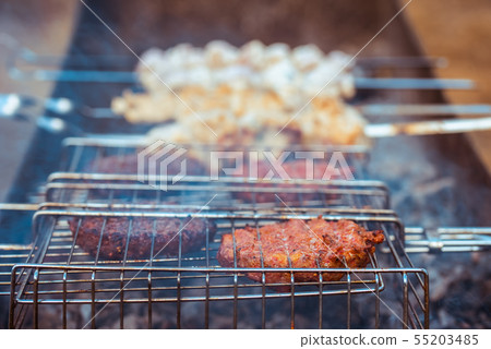 Juicy meat barbecue on a hot brazier 55203485