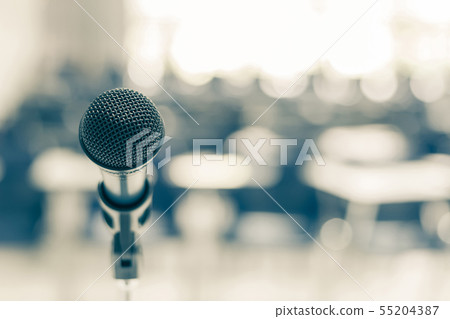 Microphone speaker in school lecture hall, seminar Microphone speaker in school lecture hall, seminar 55204387
