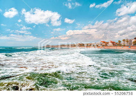 View on the town and the beach from sea with big View on the town and the beach from sea with big 55206758