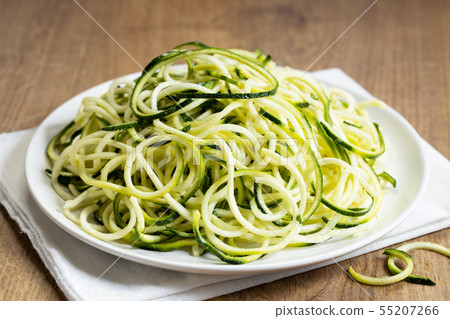 Zucchini noodles in white plate Zucchini noodles in white plate 55207266