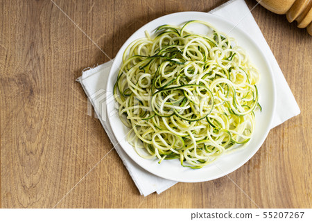 Zucchini noodles in white plate Zucchini noodles in white plate 55207267