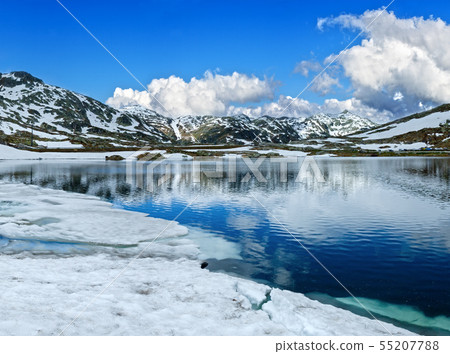 Summer Alps mountain lake, Switzerland 55207788