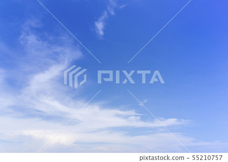 Blue sky with close up white fluffy tiny clouds 55210757