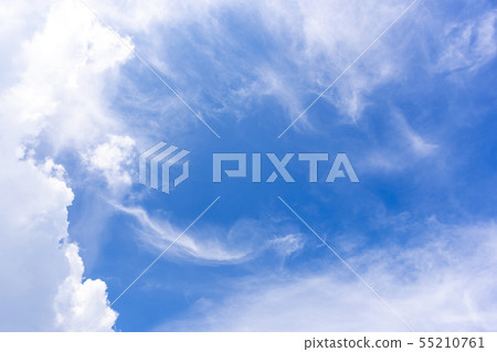 Blue sky with close up white fluffy tiny clouds 55210761