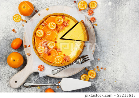 Cheesecake with slices of orange and kumquat 55213613