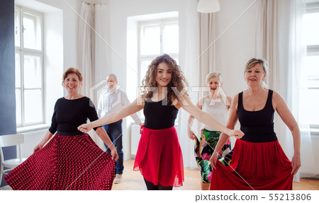 Group of senior people in dancing class with dance teacher. 55213806