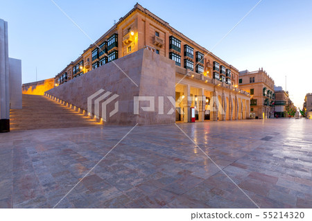 The main city street of the Republic in the light of lanterns at dawn. Valletta. The main city street of the Republic in the light of lanterns at dawn. Valletta. 55214320